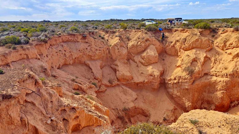Curtin Field Researcher Abseiling Into Cave Collapse