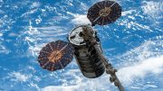 Cygnus Space Freighter in the Grips of the Canadarm2 Robotic Arm