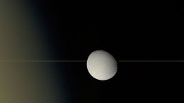 Dione on the Edge Image