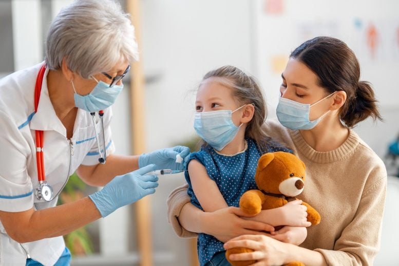 Doctor Vaccinating Child