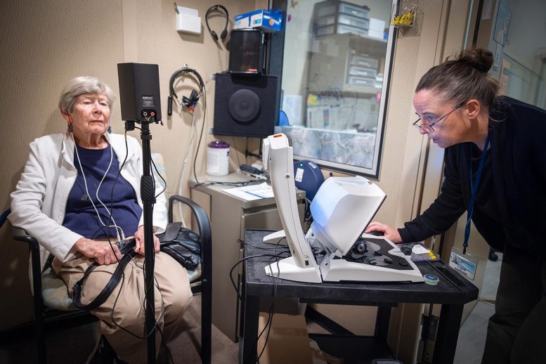 Dr. Jackie Price Adjusts Susan Bianco’s Hearing Aids