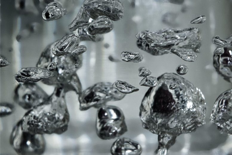 Drops of Mercury in Water