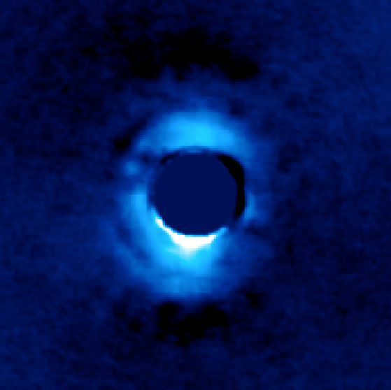 Dusty Disk of Planetary Material Surrounding Young Star HD 141569