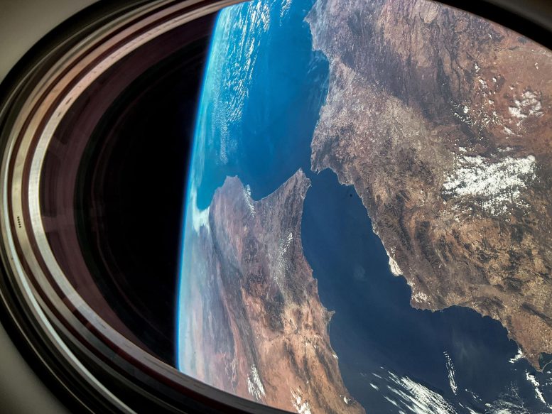 Earth Viewed From a Window on the SpaceX Dragon Endurance