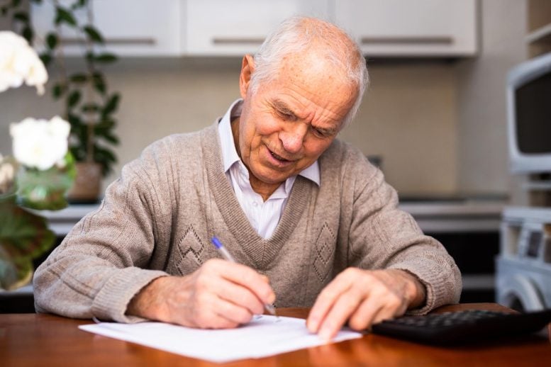 Elderly Senior Writing Letter Paper