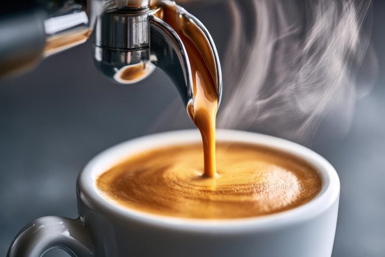 Espresso Coffee Flows From Portafilter Into Cup
