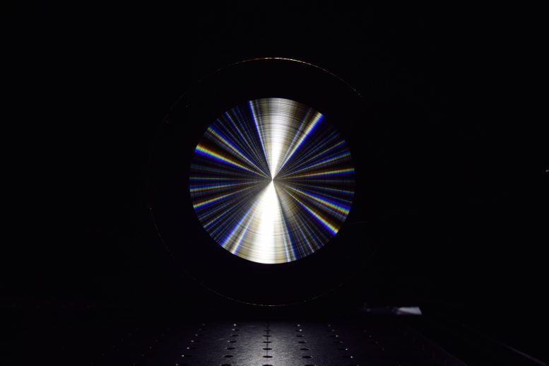 Flat Lens With Concentric Rings of Microscopic Indentations