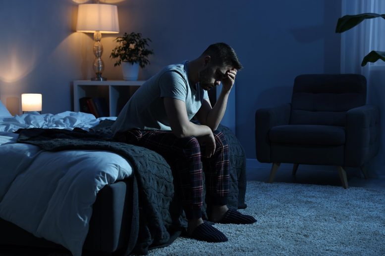 Frustrated Man Sitting on Bed No Sleep Insomnia