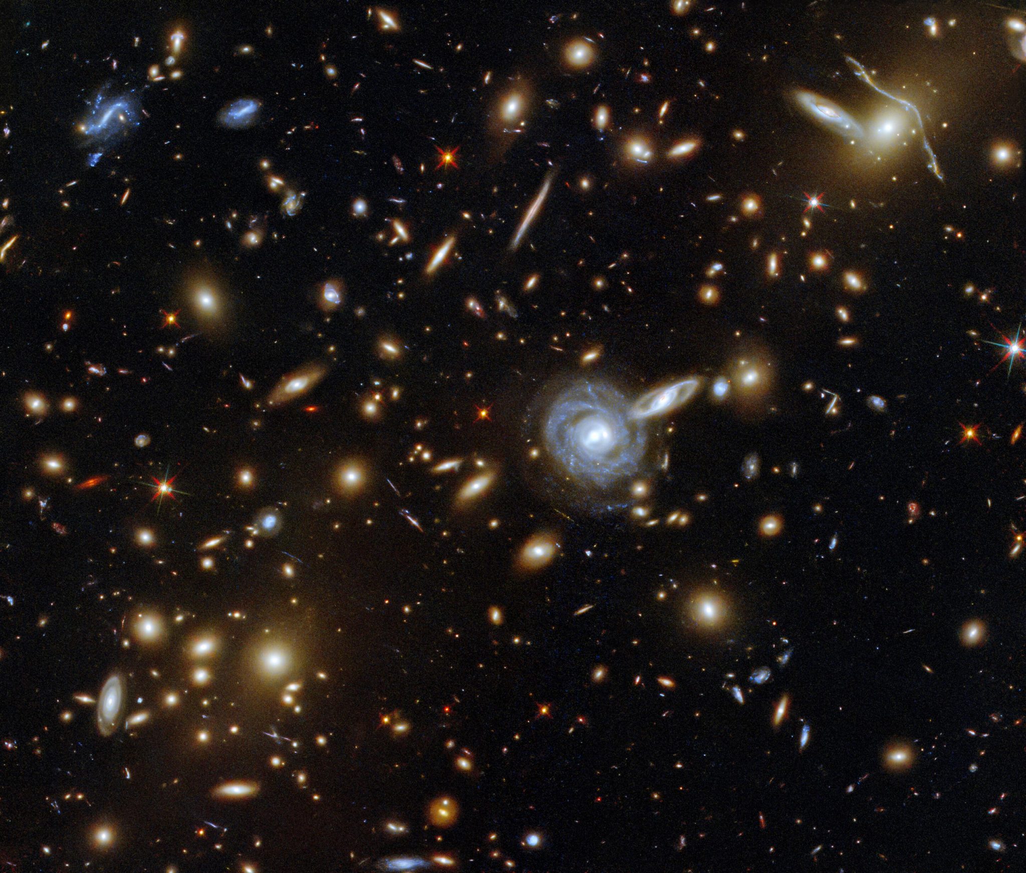 A Menagerie Of Galaxies Hubble Captures A Cluster With Galaxies Of All Shapes And Sizes 