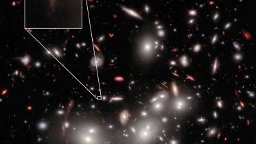 Astrophysicists Spot a Cosmic Whisper: The Faintest Galaxy in the Early Universe