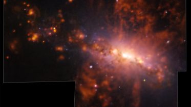 Giant Galactic Explosion Reveals Cosmic Pollution Dynamics