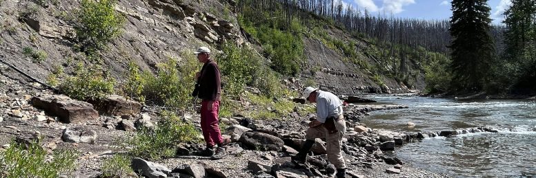 Guy Plint and Charles Helm Investigating Dinosaur Tracks