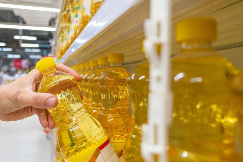 Hand Picking Vegetable Cooking Oil Store Shelf