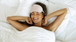 Happy Woman Waking Up in Bed Good Sleep
