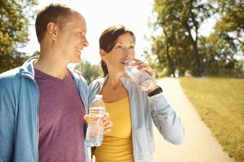Healthy Couple Drinking Water