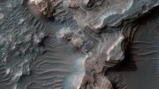 HiRISE Views Layered Deposits in Uzboi Vallis
