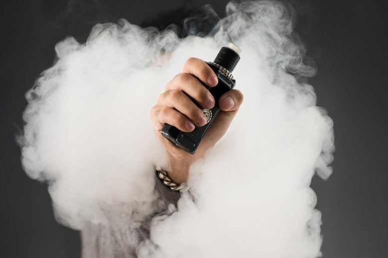 Holding Vape Smoke Cloud Vaping
