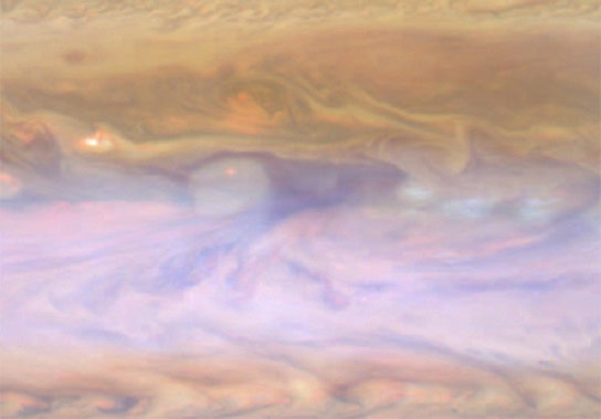 Hot Spots in Jupiter Atmosphere Are Created by a Rossby Wave