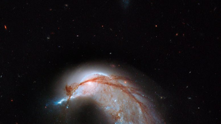 Hubble Views A Pair Of Interacting Galaxies Known As Ic 2184 