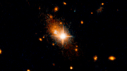 Hubble Detects Black Hole Kicked Out of Galactic Core