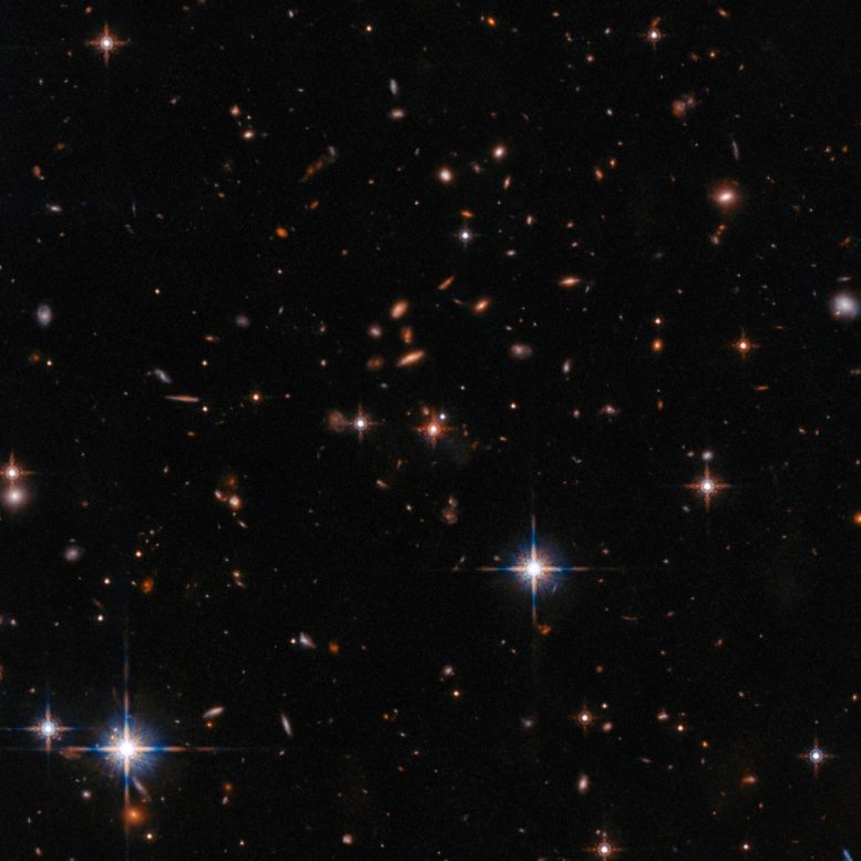 Hubble Extremely Red Quasar SDSS J165202