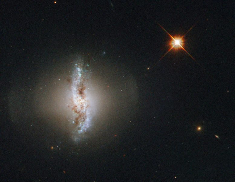 Hubble Views Arp 230