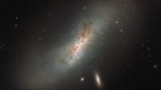 Hubble Views NGC 4424 and LEDA 213994