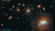 Hubble Views Spiral Bridge of Young Stars Linking Two Ancient Galaxies