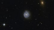 Hubble Views Spiral Galaxy RX J1140.1+0307