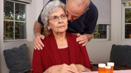 Husband Comforts Wife Alzheimer’s Disease