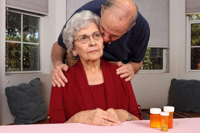 Husband Comforts Wife Alzheimer’s Disease