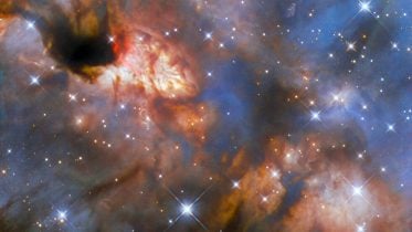 Hubble Transforms Invisible Infrared Mysteries Into Visual Wonders