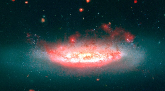 Intergalactic Wind is Stripping Galaxies of Gas