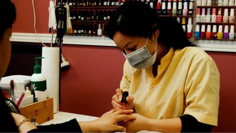 Jackie Liang works at a Toronto nail salon