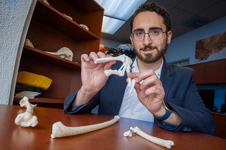 James Napoli Holds a 3D Troodontid Hand