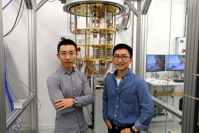 Lei Du and Tangyou Huang Beside Quantum Computer
