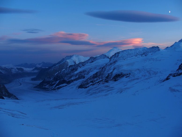 Lenticular Clouds Drift Above the Greater Aletsch Glacier, the Longest Glacier in the European Alps, Captured in September 2024