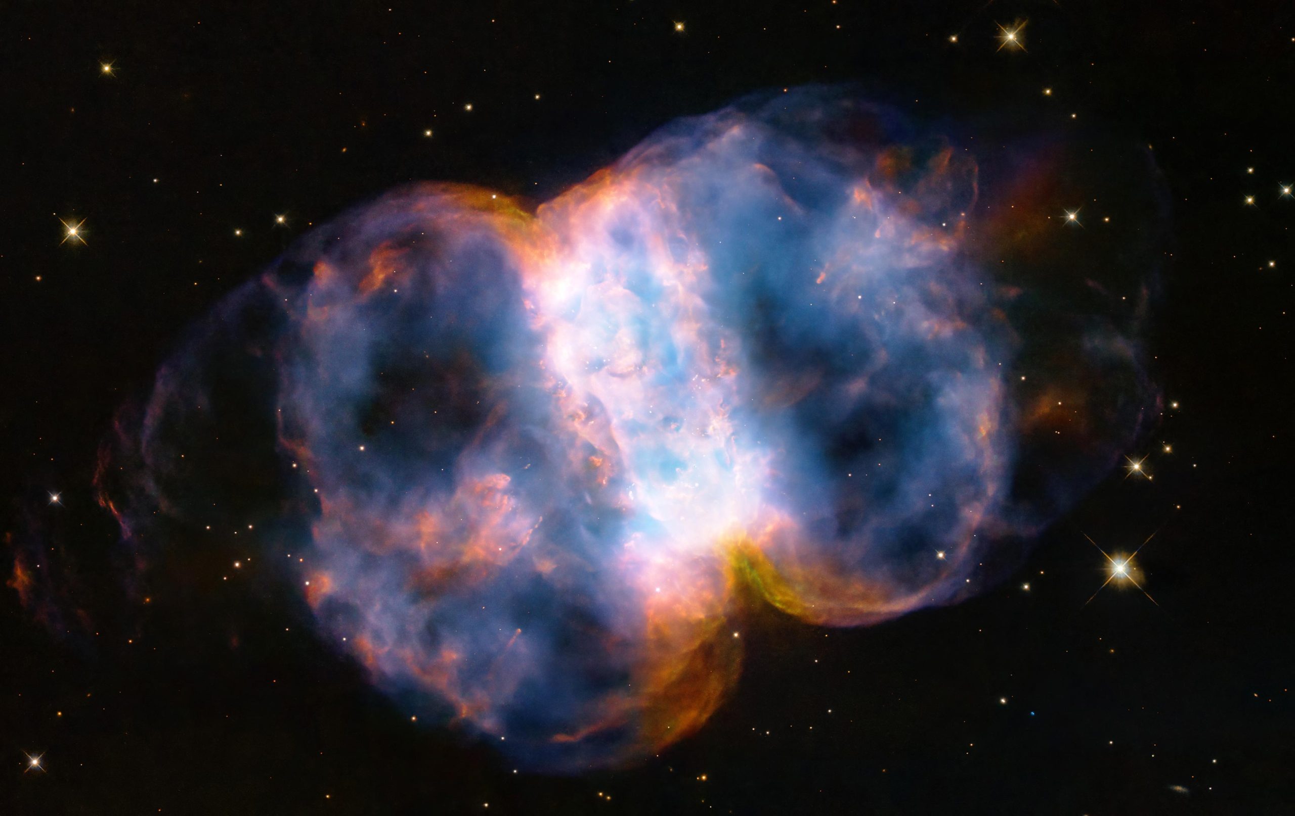 Hubble celebrates its 34th anniversary with a stunning view of the Little Dumbbell Nebula
