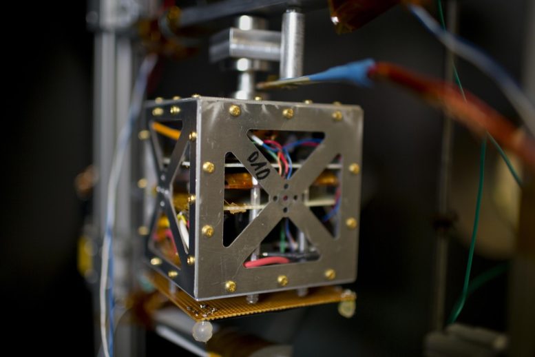 Magnetically Levitated Small Satellite Inside a Vacuum Chamber