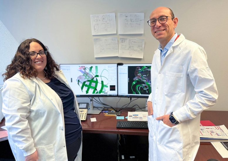 Mahmoud Salama Ahmed and Jenny Wilkerson in Front of Research