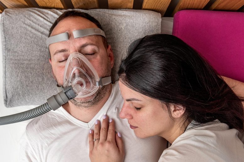 Man CPAP Machine Sleep Apnea