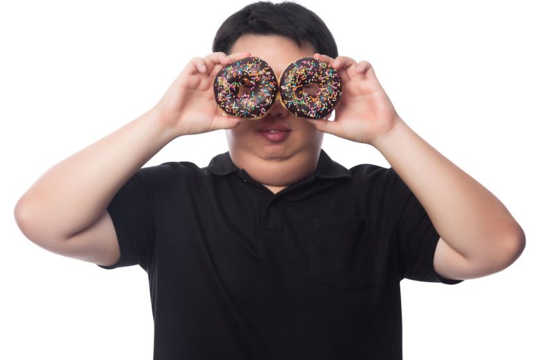 Man Holding Donuts Eyes