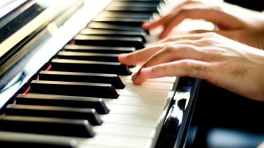 Study Finds That Playing the Piano Boosts Brain Processing Power and Reduces Depression, Stress, and Anxiety