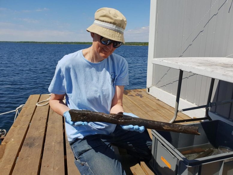 Marie Jonsson Holds a Crossbow