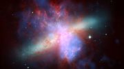 Matter blasts out of the starburst galaxy M82