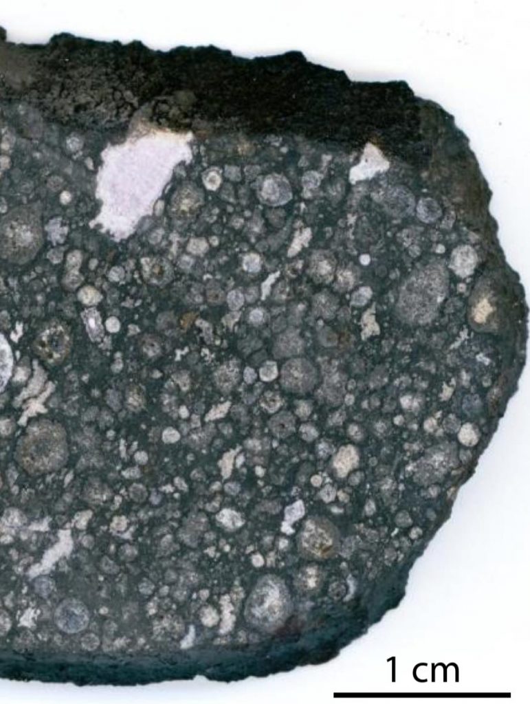 Meteorite Studded With Chips of Rock
