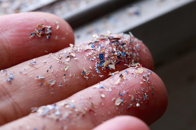 Microplastic Particles on Fingers