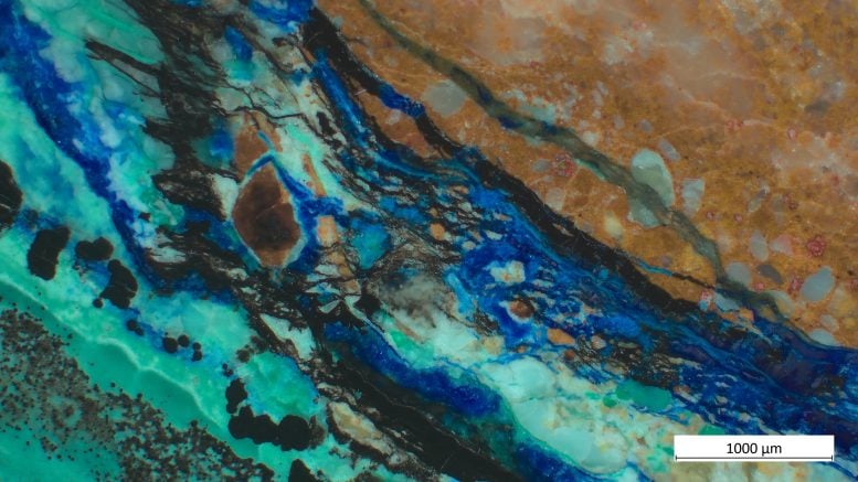 Microscope Image of Copper Ore With Hematite Impurities