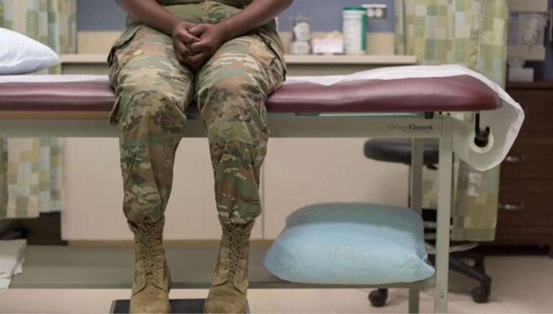 Military Personnel on a Bench