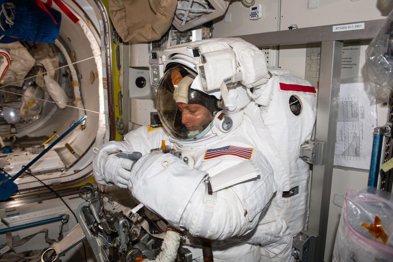 NASA astronaut Loral O'Hara tries on a spacesuit